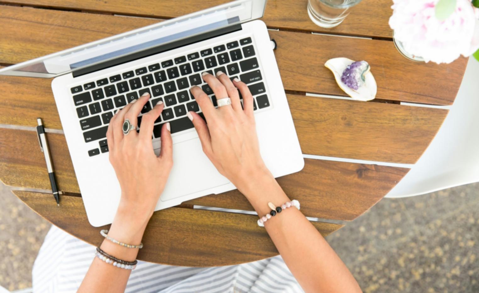 Investment monitoring workspace with multiple screens displaying real-time market data and portfolio analytics